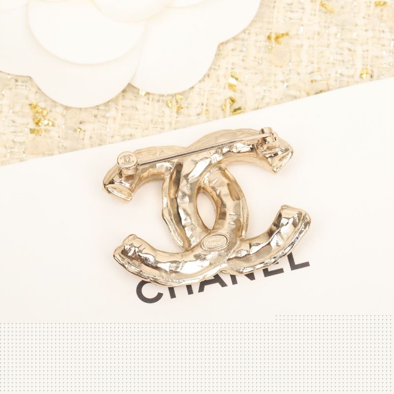 Ch*el brooches